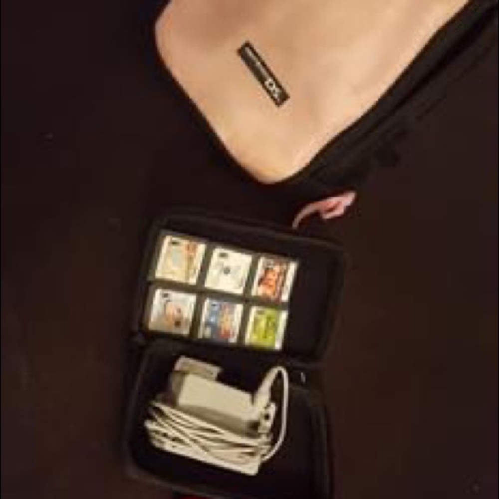 Nintendo DSI, 6 games, charger, bag and case